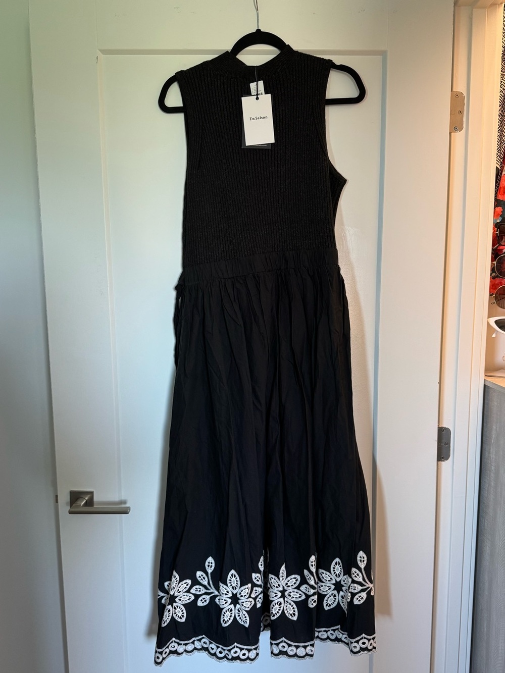 En Saison Black Maxi Dress with White Floral Hem Embroidery from Anthropologie